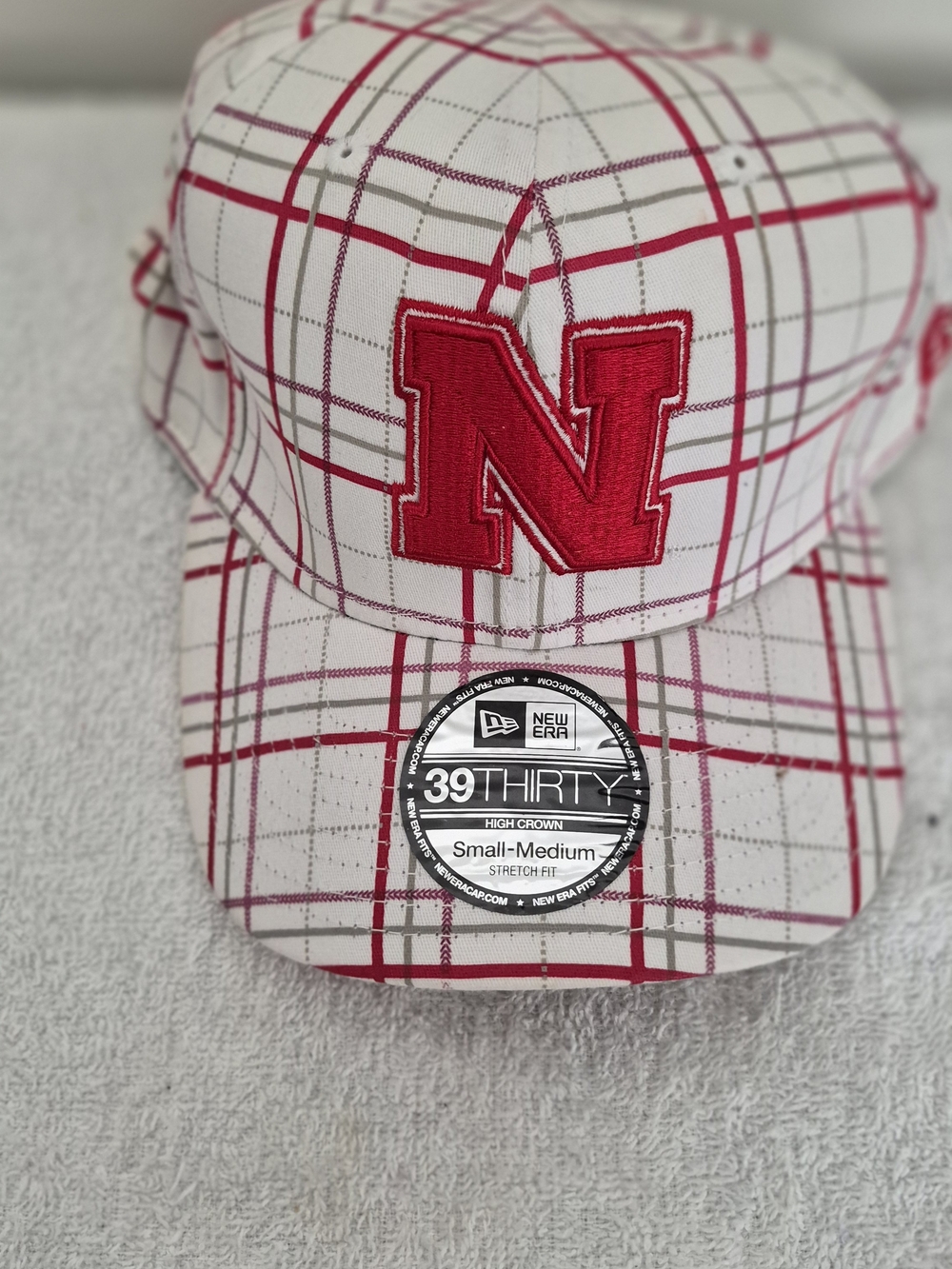 New Era Mens White & Red Plaid Cap with Nebraska